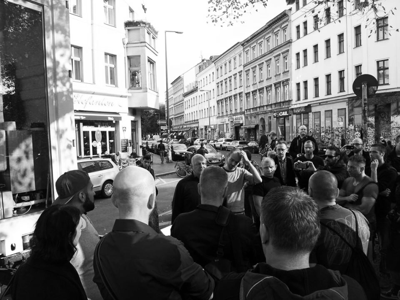 Angry protesters and security around Verhoeven in Heinrich Platz, Berlin, Oct. 2014. 